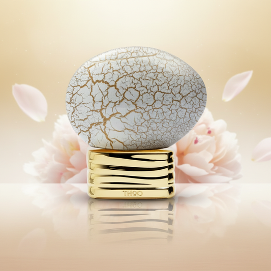 THoO Breath of the Infinite perfume bottle with a fresh floral woody notes-inspired background