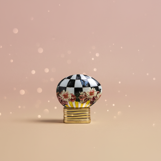 THoO BonBon Pop EDP 75ml original perfume bottle with a soft blush-pink and champagne background